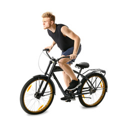Obraz na płótnie Canvas Sporty young man riding bicycle against white background