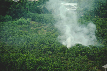 smoky from villagers Burning waste and tree in the provinces , thailand
