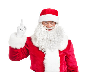 Portrait of Santa Claus with raised index finger on white background