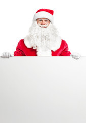Portrait of Santa Claus with blank poster on white background