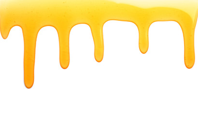 Spilled honey on white background