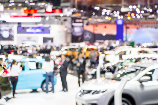 blurred people in motor show