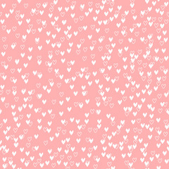 Abstract vector seamless pattern with chaotic hearts. Classical neutral backdrop. Hand drawn randomly scattered white hearts on pink background. Repeating backdrop for teens, girls,  - 282384225