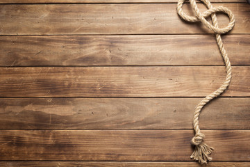 ship rope at wooden board background