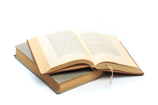 vintage old hardcover books on white background