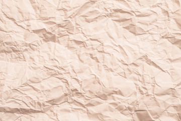 Blank beige creased paper. Crushed texture. Cellulose industry. Abstract art background. Copy space.