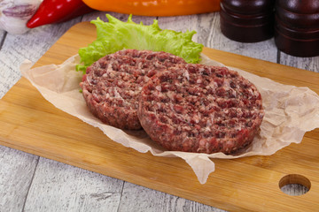 Raw burger cutlet
