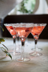 Beautiful glasses of champagne are on the wedding table