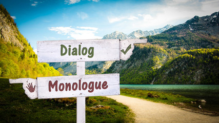 Street Sign to Dialog versus Monologue