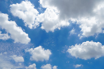 Naklejka na ściany i meble Cloudy on blue sky background.