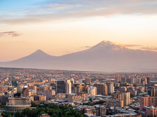 Yerevan buildings and Mount Ararat on summer evening