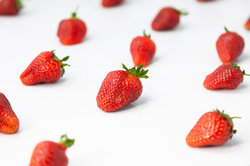 Strawberry on white background. Ripe juicy berries on white surface.  