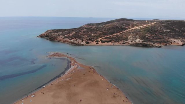 Aerial: Flying backwards on beautiful Prasonisi Kite Beach, Rhodes
