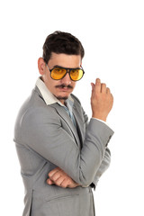 Special businessman with vintage glasses and grey suit