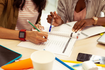 Close up of female hands that making notes