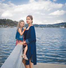 Fototapeta na wymiar Mother and daughter at Xuan Huong Lake, Dalat, Vietnam