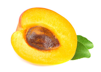 apricot slice with green leaf isolated on a white background