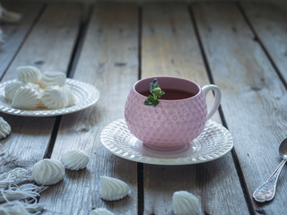 Light lunch with tea and cookies in elegant ceramic ware