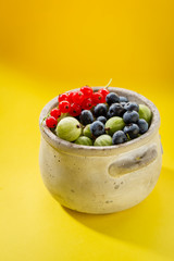 Summer berry set in concrete bowl