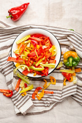 Harvest yellow and red bell pepper, sliced paprika