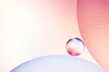 Abstract air bubbles in water on varicolored blurred background