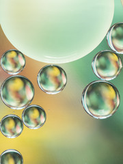 Abstract clear air bubbles on defocused multicolored background