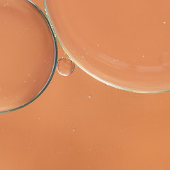 Abstract air bubbles in liquid on blurred background