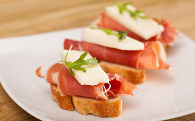 perfect sandwich made with rye bread cheese and Parma ham