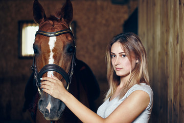 portrait of a young girl with a horse.