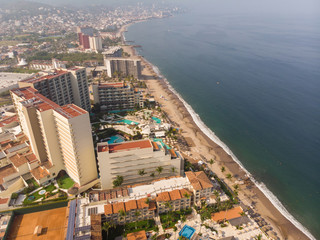 Fototapeta na wymiar Aerial photos of the beautiful beach and hotels of Puerto Vallarta in Mexico, the town is on the Pacific coast in the state known as Jalisco