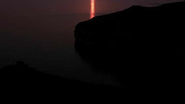 Silhouette of Dingli Cliffs at Sunset