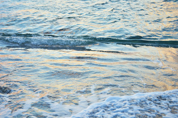 Sparkling water surface on sunset.  Nature background concept. - Image