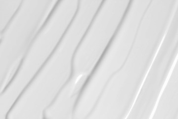 Obraz premium BB, CC cream texture. White beauty balm background. Cosmetic face cream smudge