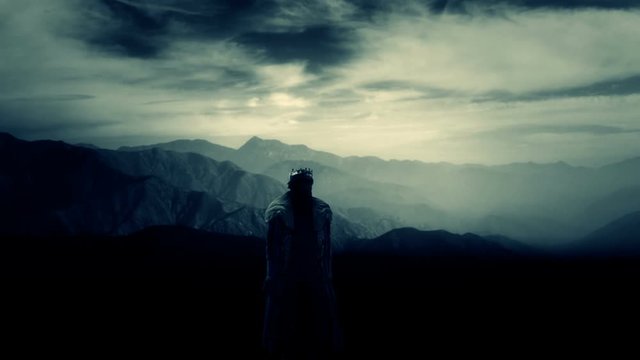 Lonely King with a Crown Watching his Kingdom 