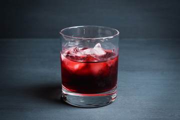 Old fashioned cherry cocktail with berries. Selective focus. Shallow depth of field. 