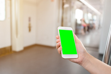 Hand holding Smart phone with blank screen.