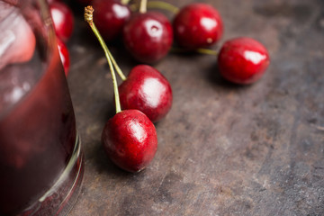 Old fashioned cherry cocktail with berries. Selective focus. Shallow depth of field. 