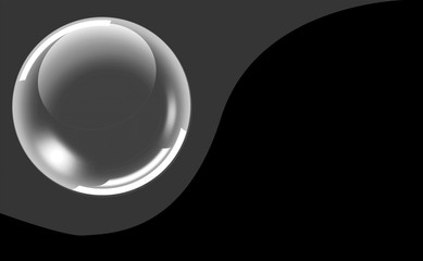 Abstract image. Frame divided by wave into black and gray textured part with light large bubble in gray part.