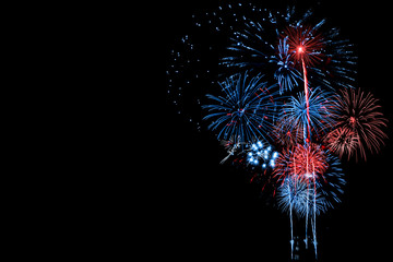 Red and Blue Fireworks on Black background - Powered by Adobe