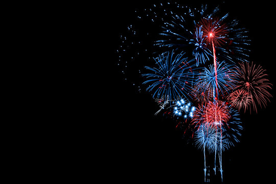 Red and Blue Fireworks on Black background