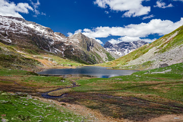 Fototapeta na wymiar Panoramic view of the Pasitt Pass with its alpine lakes, in the Swiss Alps.