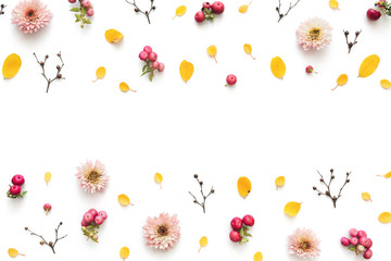 Autumn Background With Pink Flowers, Berries And Yellow Leaves