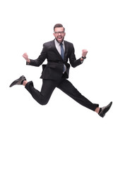in full growth. happy dancing young businessman