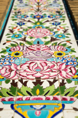 Fototapeta premium Decorative tilework on brick wall, Jame mosque, Kermanshah city, Iran