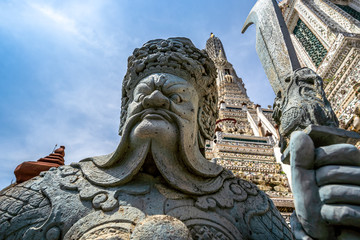 Fototapeta na wymiar Bangkok, Thailand at Wat Arun Temple, One of antique chinese giant statues in measure from Thailand..
