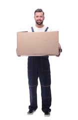 rear view. a young man with a cardboard box looking at the camera