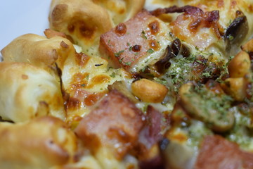 Cheese Meat Italian Pizza On Plate With Wooden Table In The Background