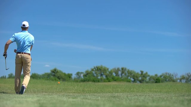 Nervous male golfer hitting swing bad shot at course, furious about losing ball