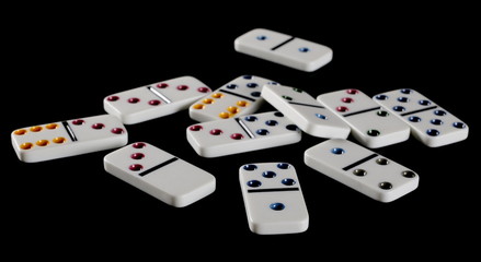 Fototapeta na wymiar White dominoes, pieces isolated on black background