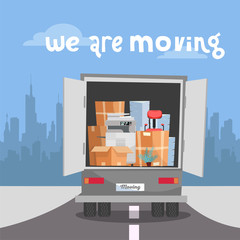 Corporate Moving into new office.Business Relocation in new place.Things in Box in Truck set. truck with printer, stacks of folders drives to side of city's silhouette. flat cartoon illustration